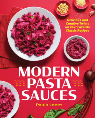cover of modern pasta sauces cookbook. Text reads delicious and creative twists on your favorite classic recipes. White plate with pink pasta. White bowl of pureed beets. Pink bowl of pine nuts. Pink bowl with grated cheese. Fresh beet in corner.