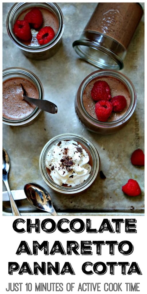 Chocolate Amaretto Panna Cotta in small glass jars. Garnished with whipped cream and chocolate shavings plus raspberries. Small spoons to side.