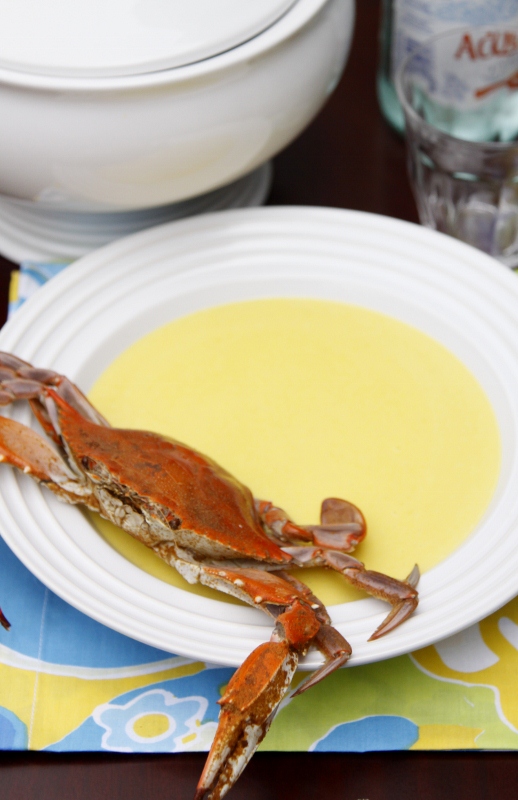corn soup in white bowl with crab. 