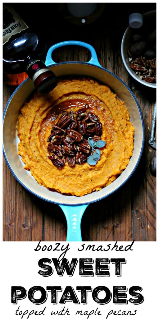 Boozy Smashed Sweet Potatoes in blue pot topped with maple pecans 