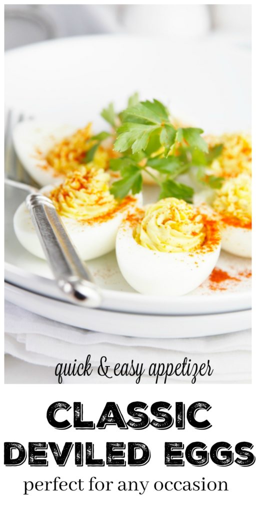 Classic Deviled Eggs on white plate garnished with parsley 