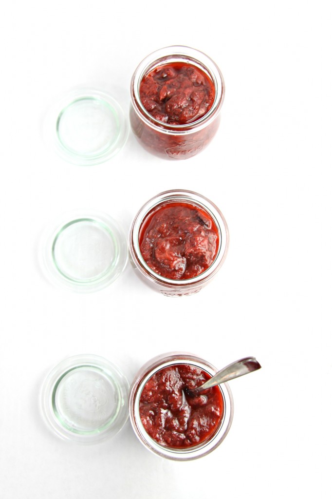3 small glass jars Roasted Strawberry Rhubarb Preserves. Lids to side. 