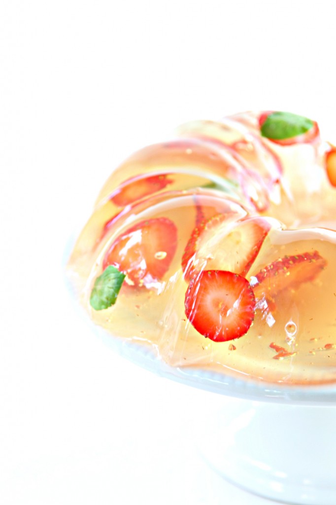 Champagne Gelatin Mold with visible mint and strawberries. 