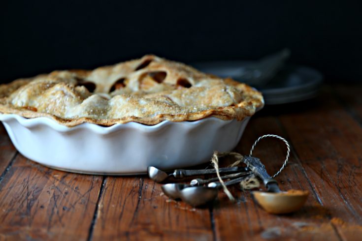 Momma's Apple Pie with measuring spoons to side