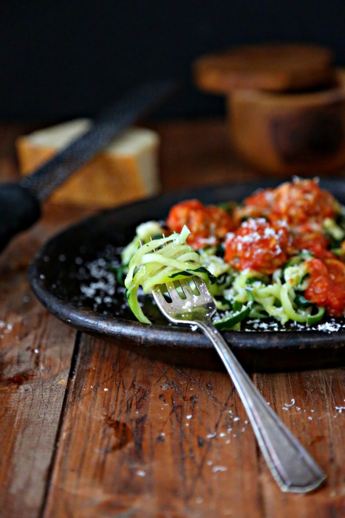 Zucchini Noodles and Meatballs on brown plate with fork