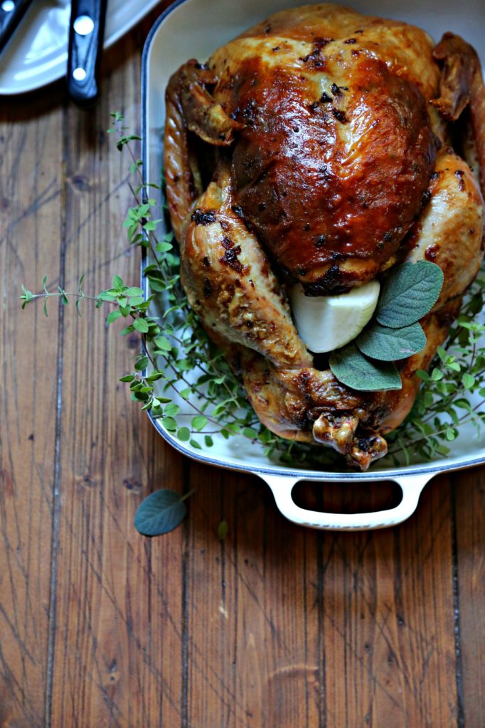 Mayonnaise Herb Roasted turkey in roaster with herbs