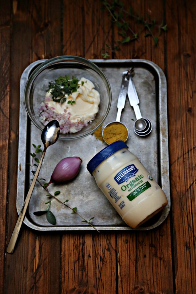 bowl of mayonnaise herb shallot ingredients on baking sheet 