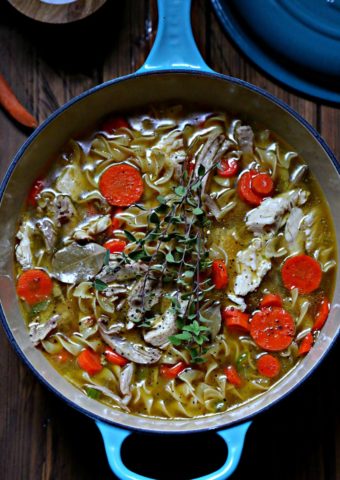 Quick and Easy Homemade Chicken Noodle Soup in blue pot