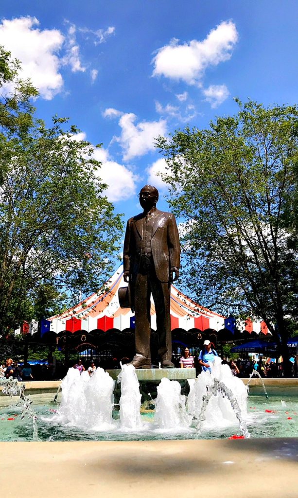 statue of Milton Hershey in fountain.