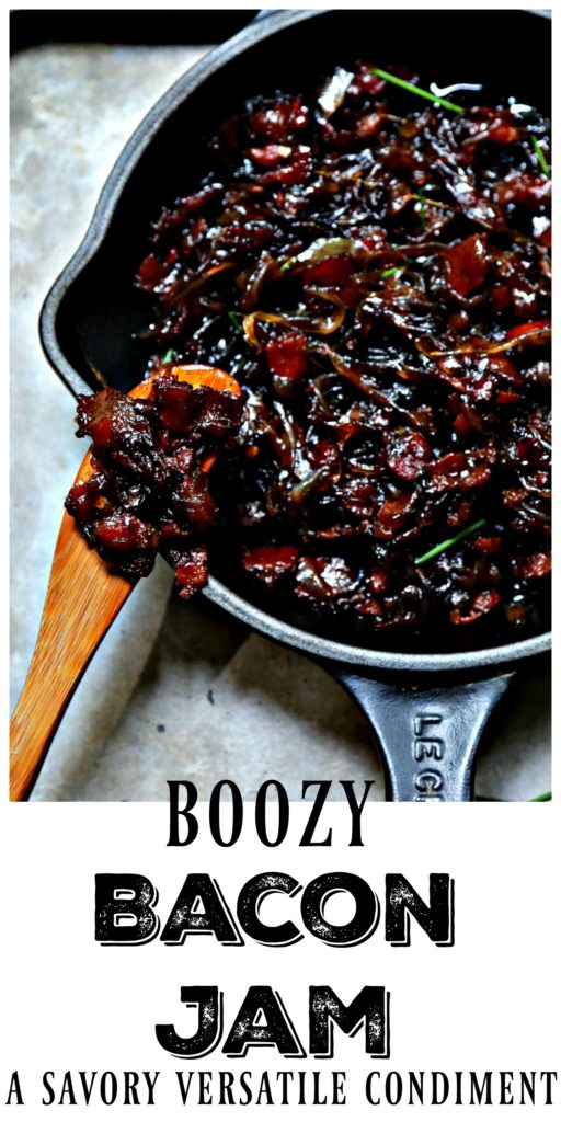 Pinterest image. Bacon jam in cast iron skillet with wooden knife. Text overlay reads Boozy Bacon Jam. A savory versatile condiment. 