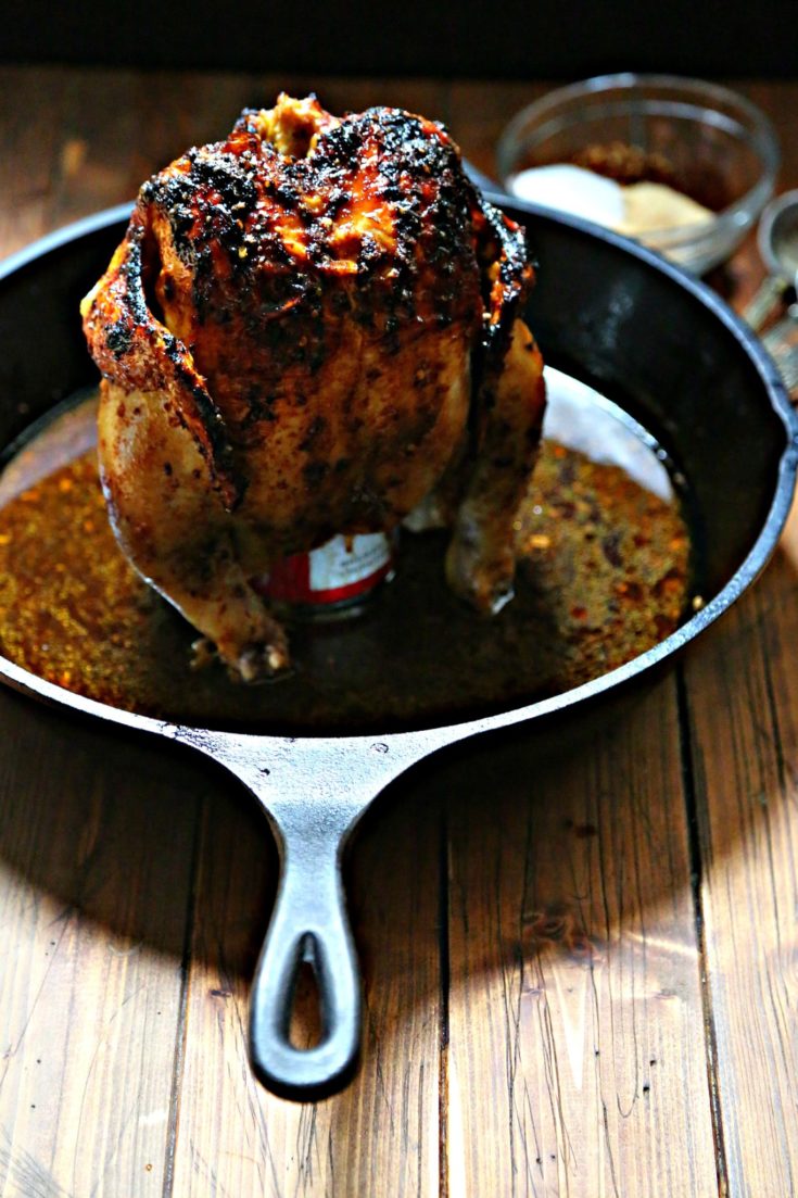 Whole chicken in cast iron skillet.